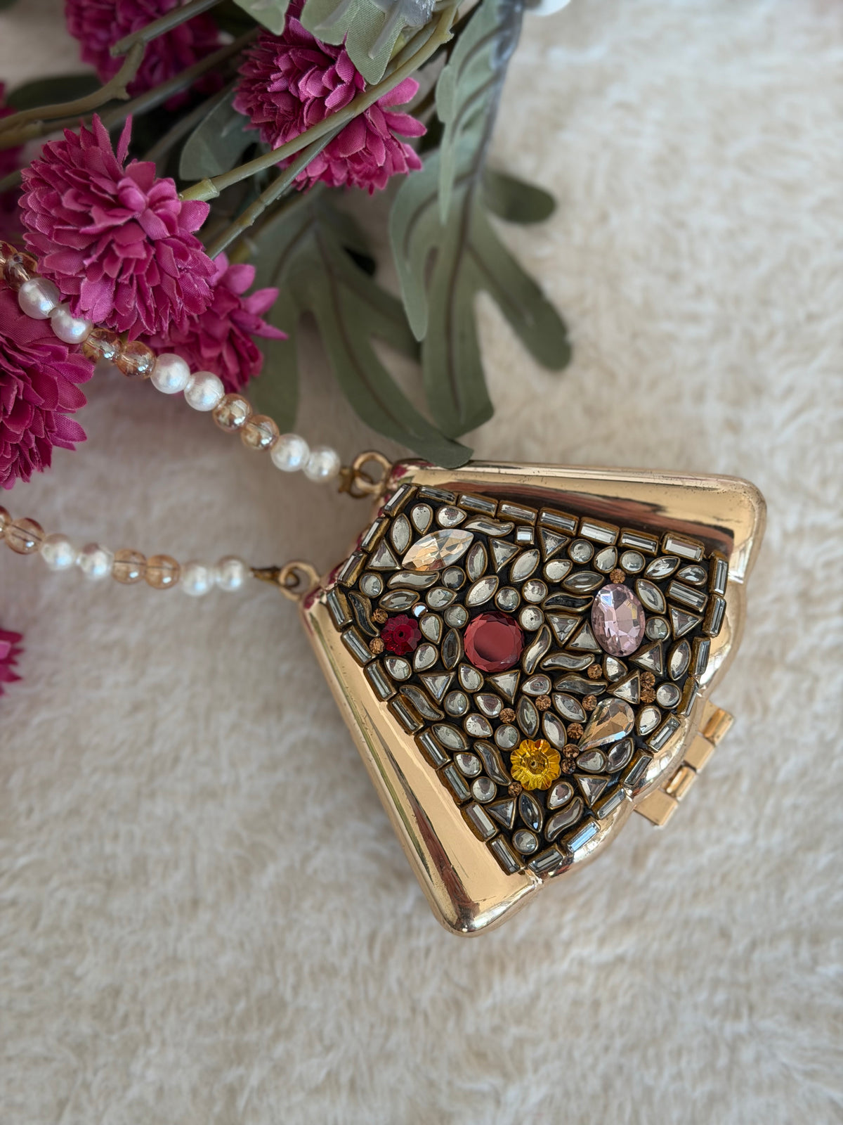 Dual Sided Triangle Clutch